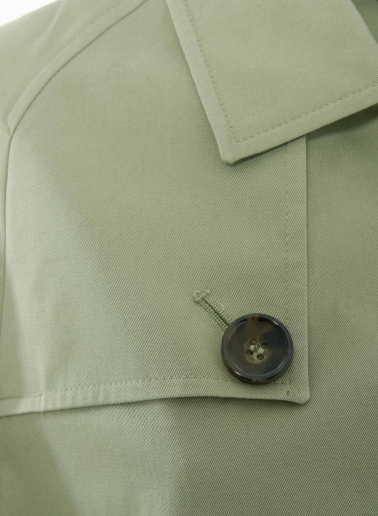 Military green cotton jacket with shirt collar and trench-style flap