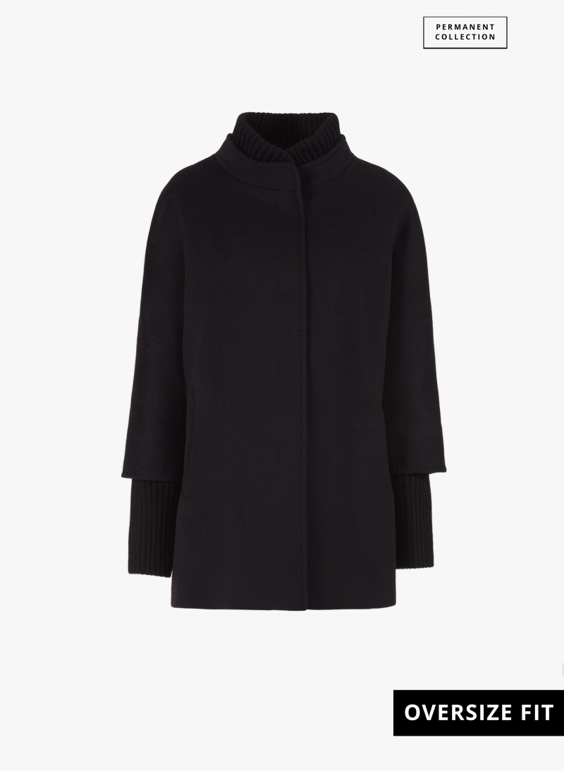 Short oversized black pure wool coat with knitted details