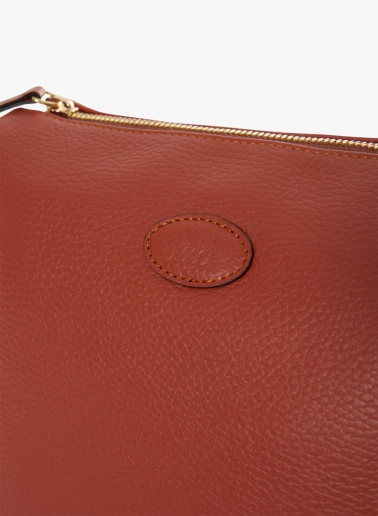 Terracotta colour genuine leather crossbody big bag with three compartments