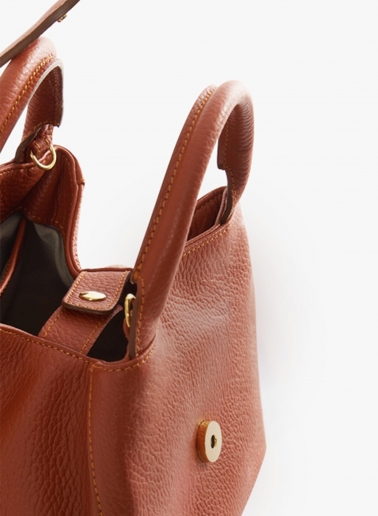 Terracotta colour genuine leather mini handbag with strap