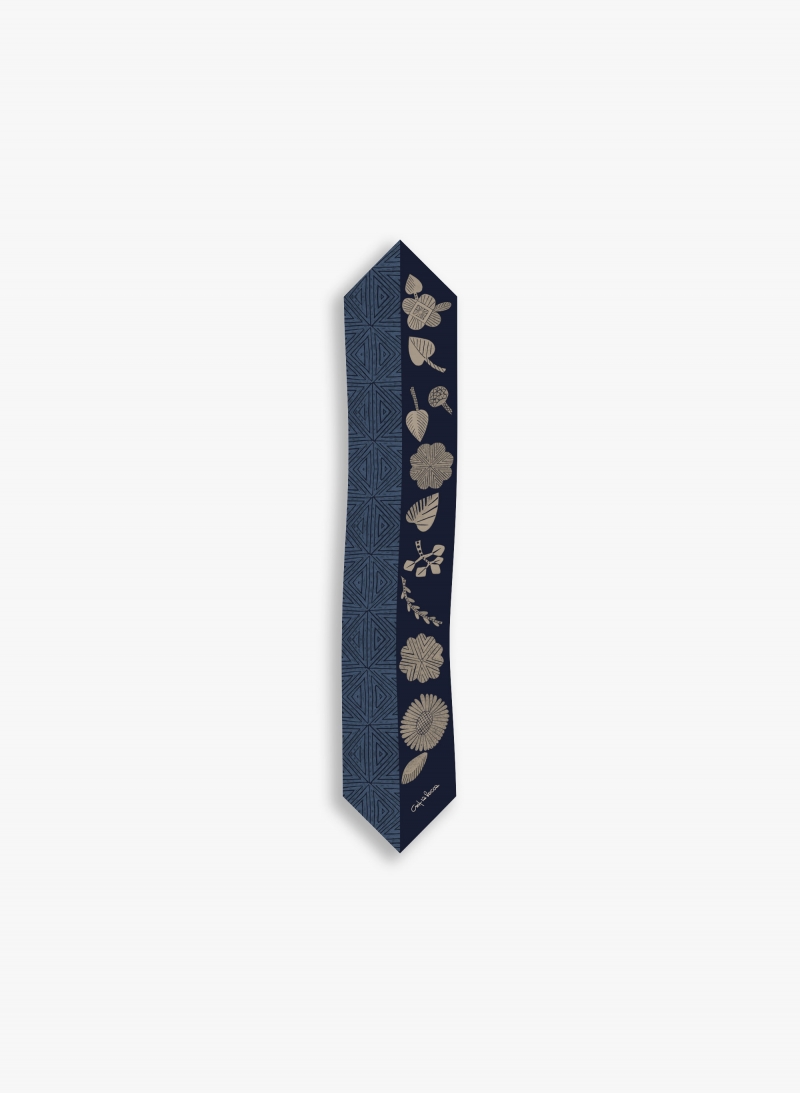 Blue twill silk headband with geometric pattern and leaves