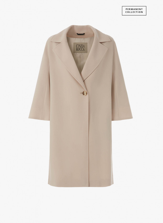 Assymetrical sand overcoat in comfort wool